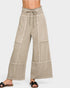 Beige wide-leg pants with white stripes on a white background