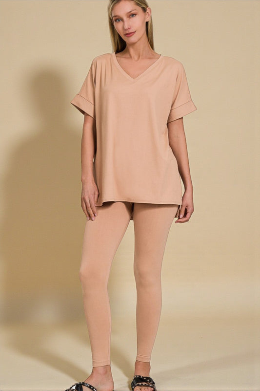 Woman wearing a beige outfit on a beige background