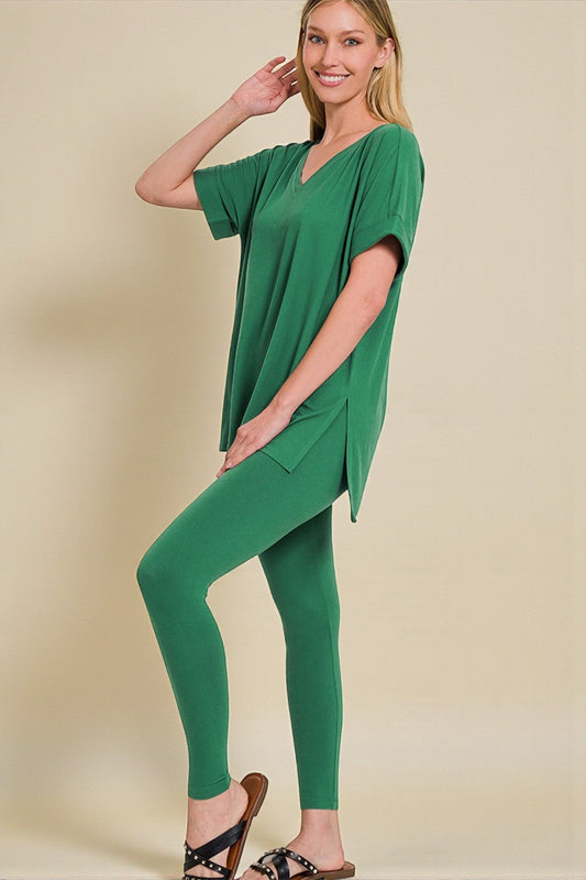 Woman wearing a green outfit on a beige background