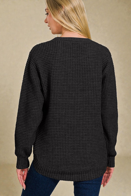 Pull en tricot gaufré à manches longues et col montant en noir