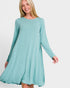 Woman wearing a light blue dress on a white background