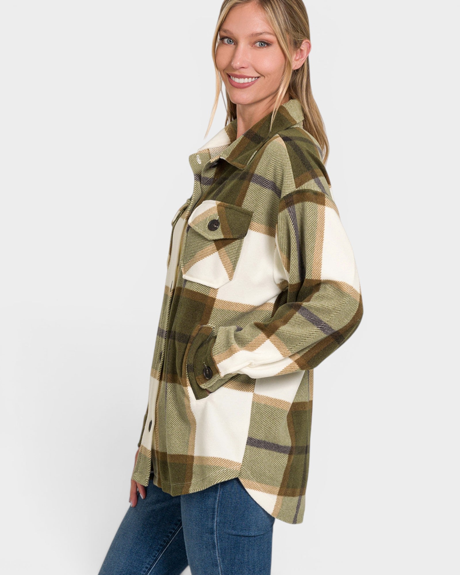 Woman wearing a plaid shirt with a white background