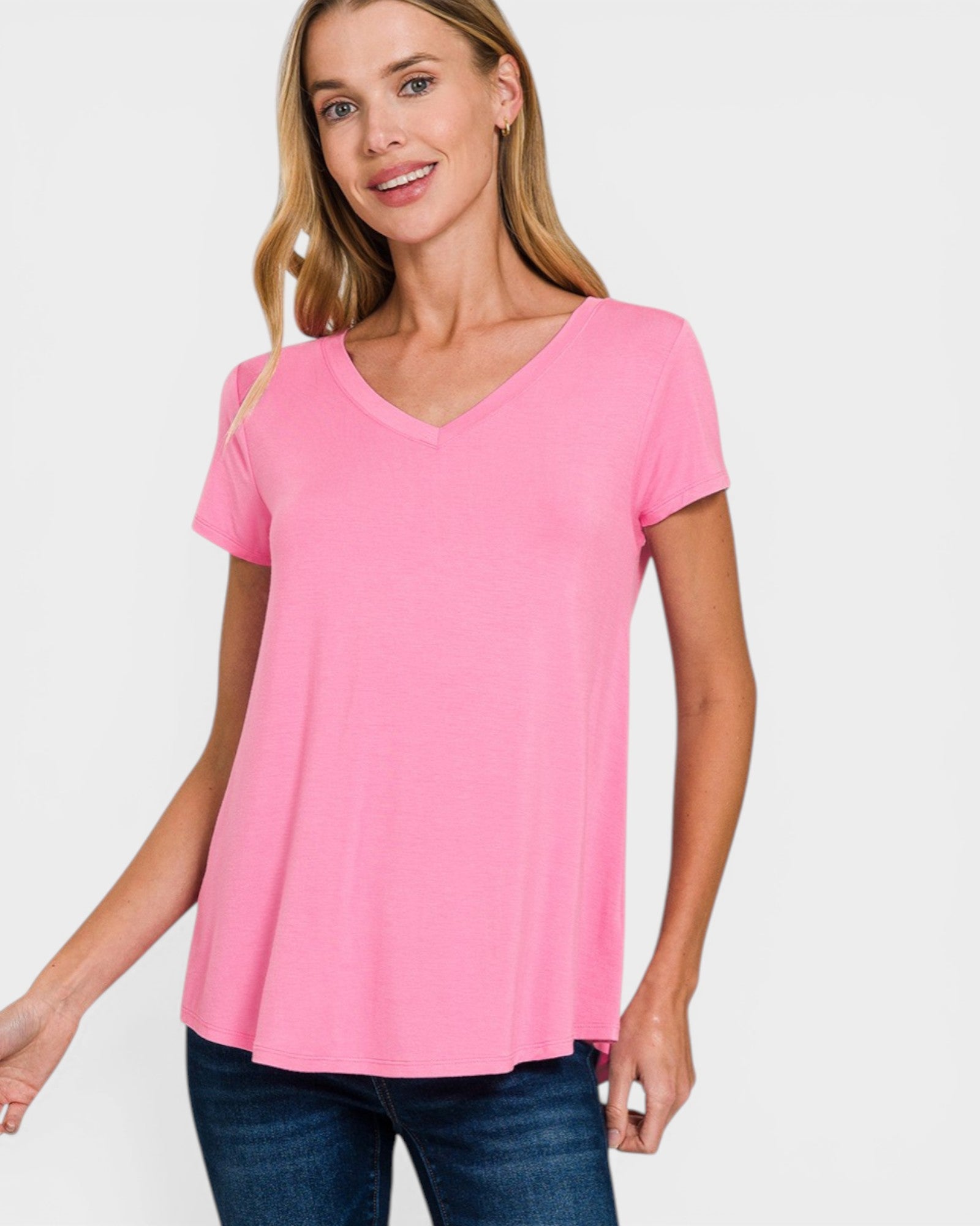 Woman wearing a pink t-shirt on a white background