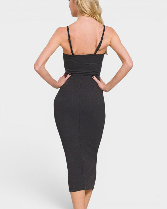 Black dress worn by a person on a white background