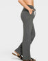 Gray checkered pants worn by a person on a white background