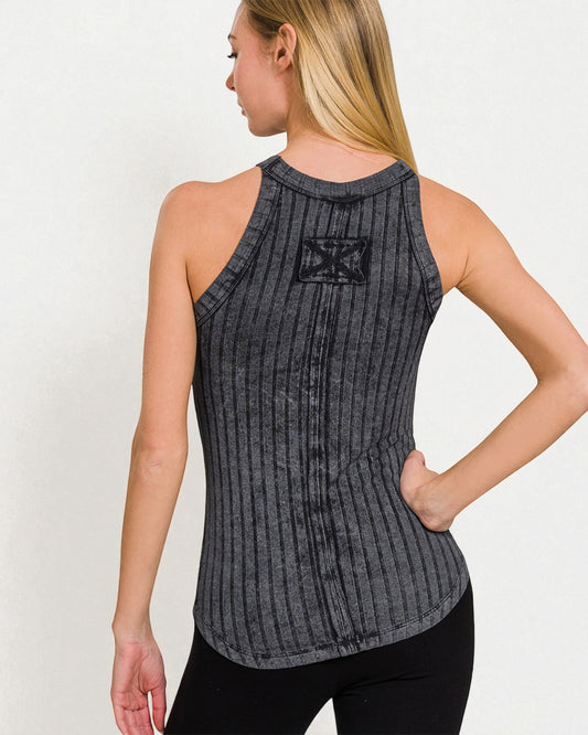 Woman wearing a black ribbed tank top with a logo on a white background
