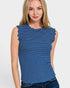 Woman wearing a blue striped sleeveless top against a white background