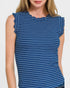 Woman wearing a blue and white striped sleeveless top on a plain background