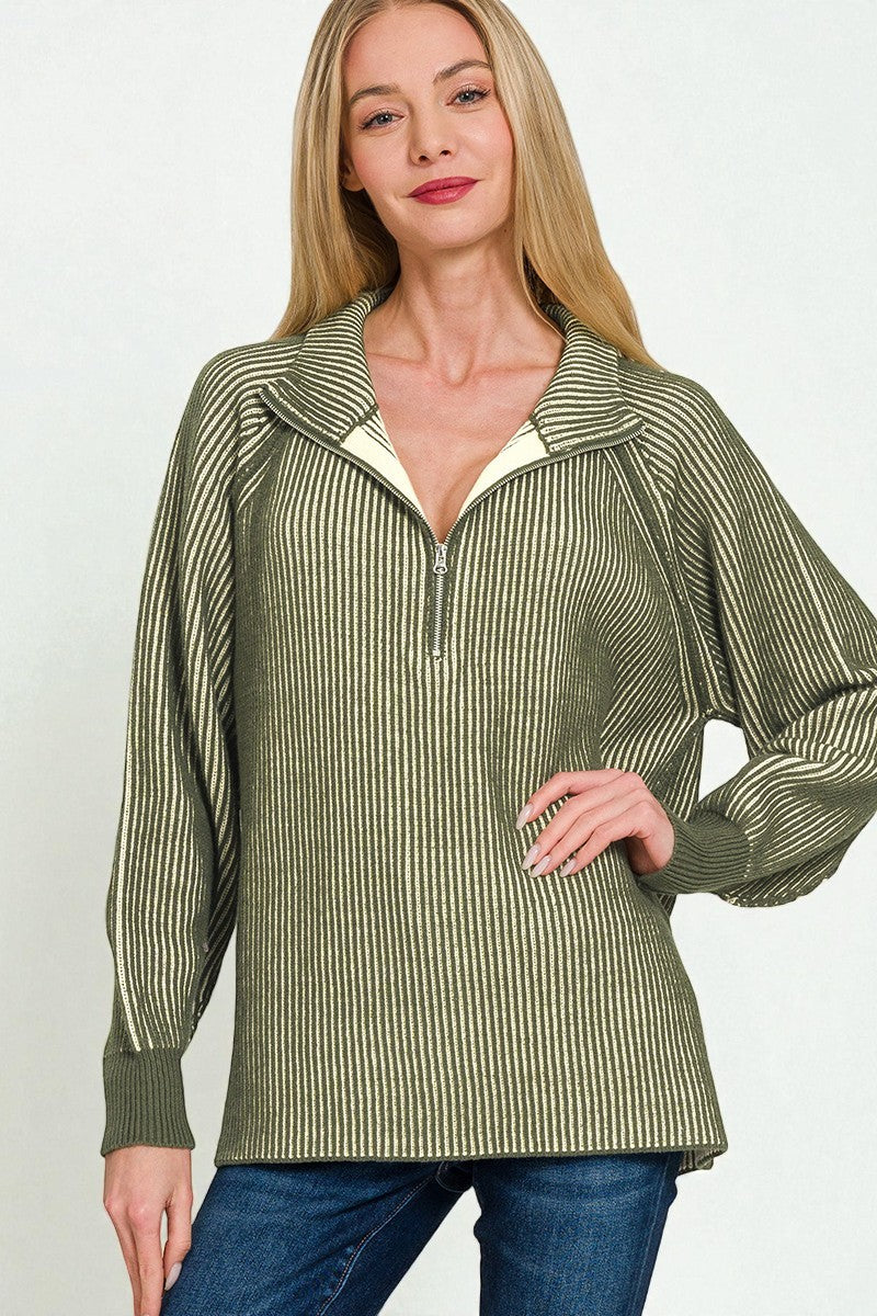 Woman wearing a green and white striped shirt with a plain background