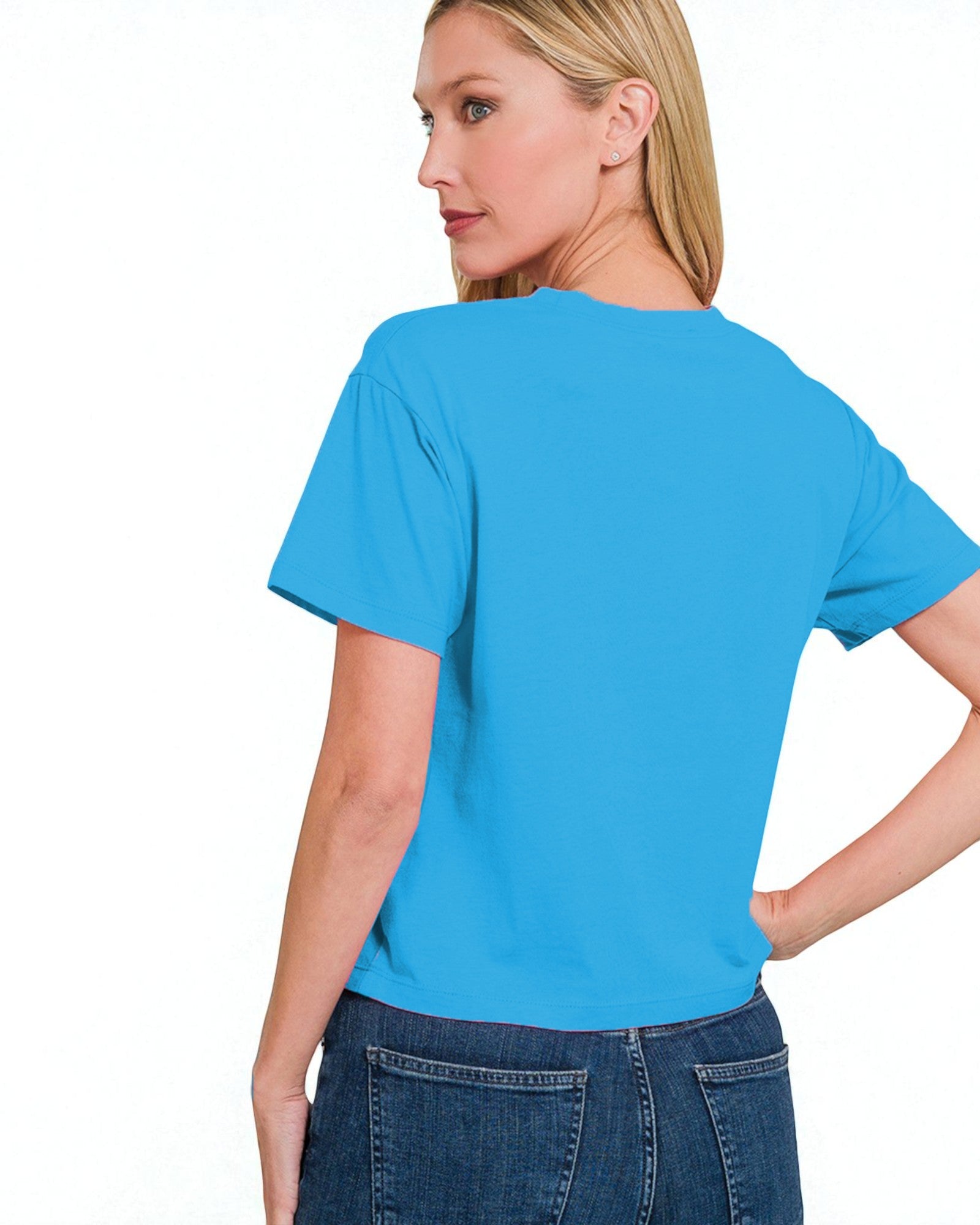 Woman wearing a blue t-shirt on a white background