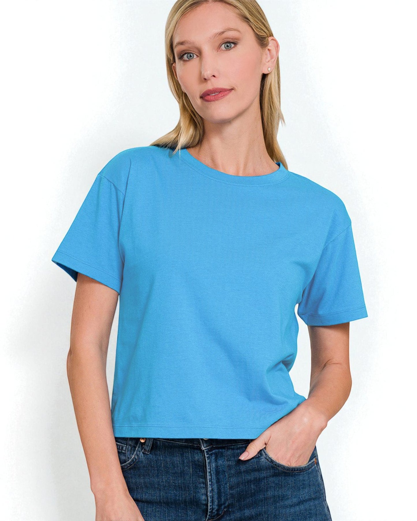 Woman wearing a blue t-shirt against a white background