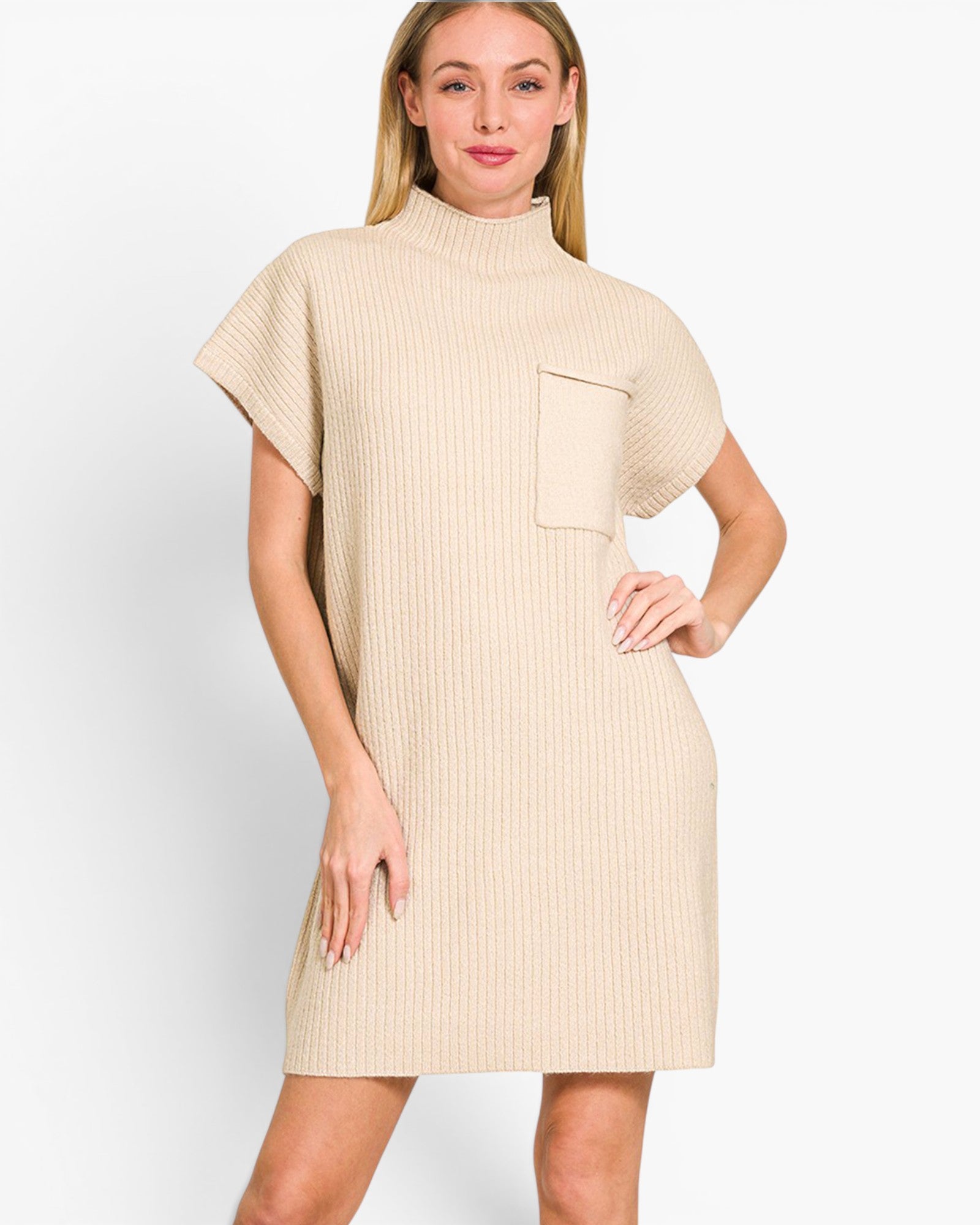 A woman modeling a beige ribbed knit mock-neck dress with short sleeves and a chest pocket, set against a plain light gray studio background.