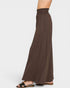 Brown wide-leg pants worn by a person on a white background