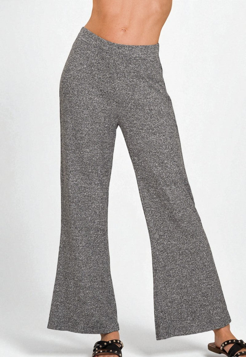 Gray wide-leg pants worn by a person on a white background
