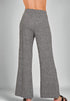 Gray flared pants on a gray background