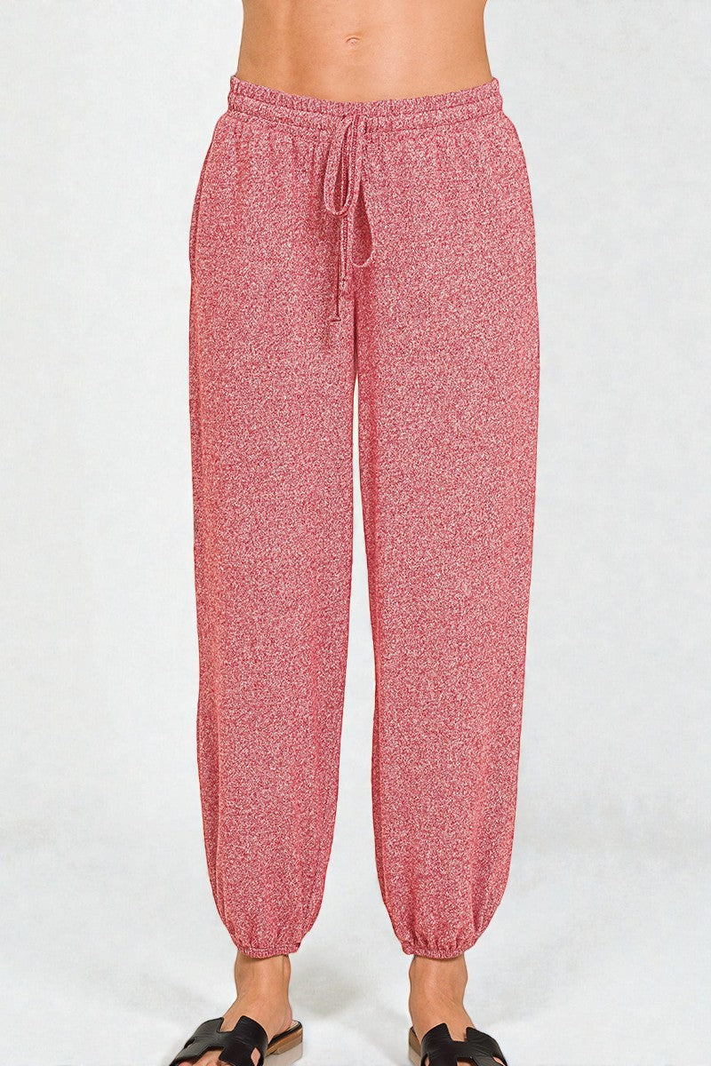 Red patterned pants on a white background