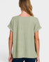 Woman wearing a green t-shirt on a white background