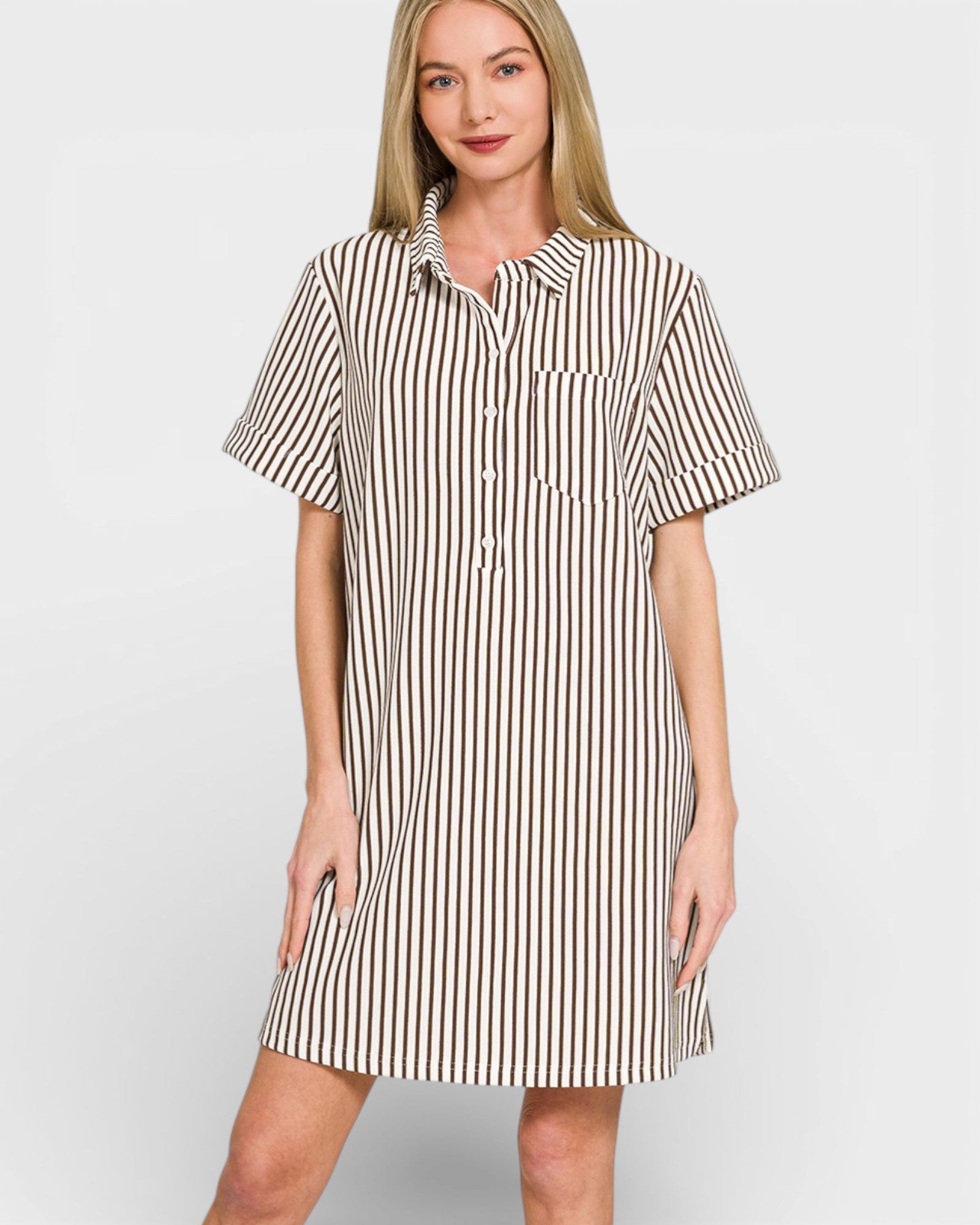 Woman wearing a striped shirt dress on a white background