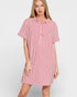 Woman wearing a red and white striped shirt dress on a white background