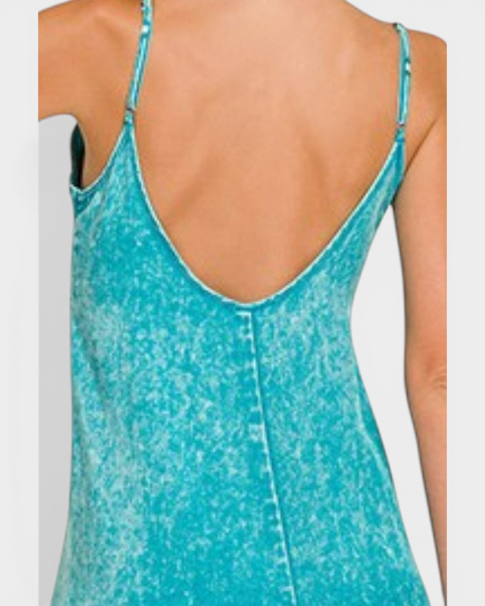 Close-up of a turquoise tank top with thin straps on a white background