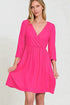 Robe courte à volants et manches trois-quarts avec poches en rose vif