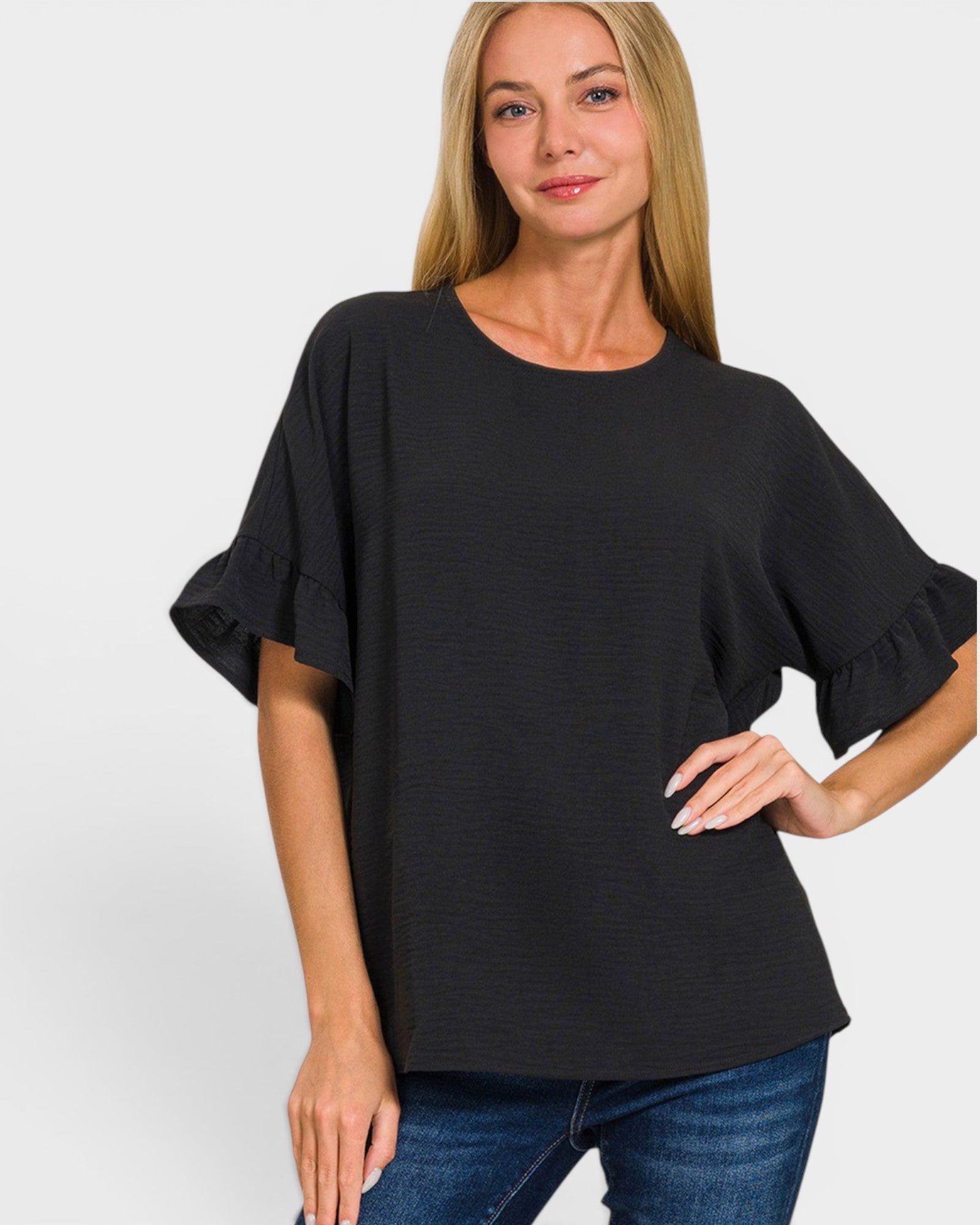 Blusa con mangas onduladas en color negro