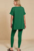 Person wearing a green outfit on a beige background