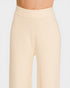 Beige ribbed pants on a white background