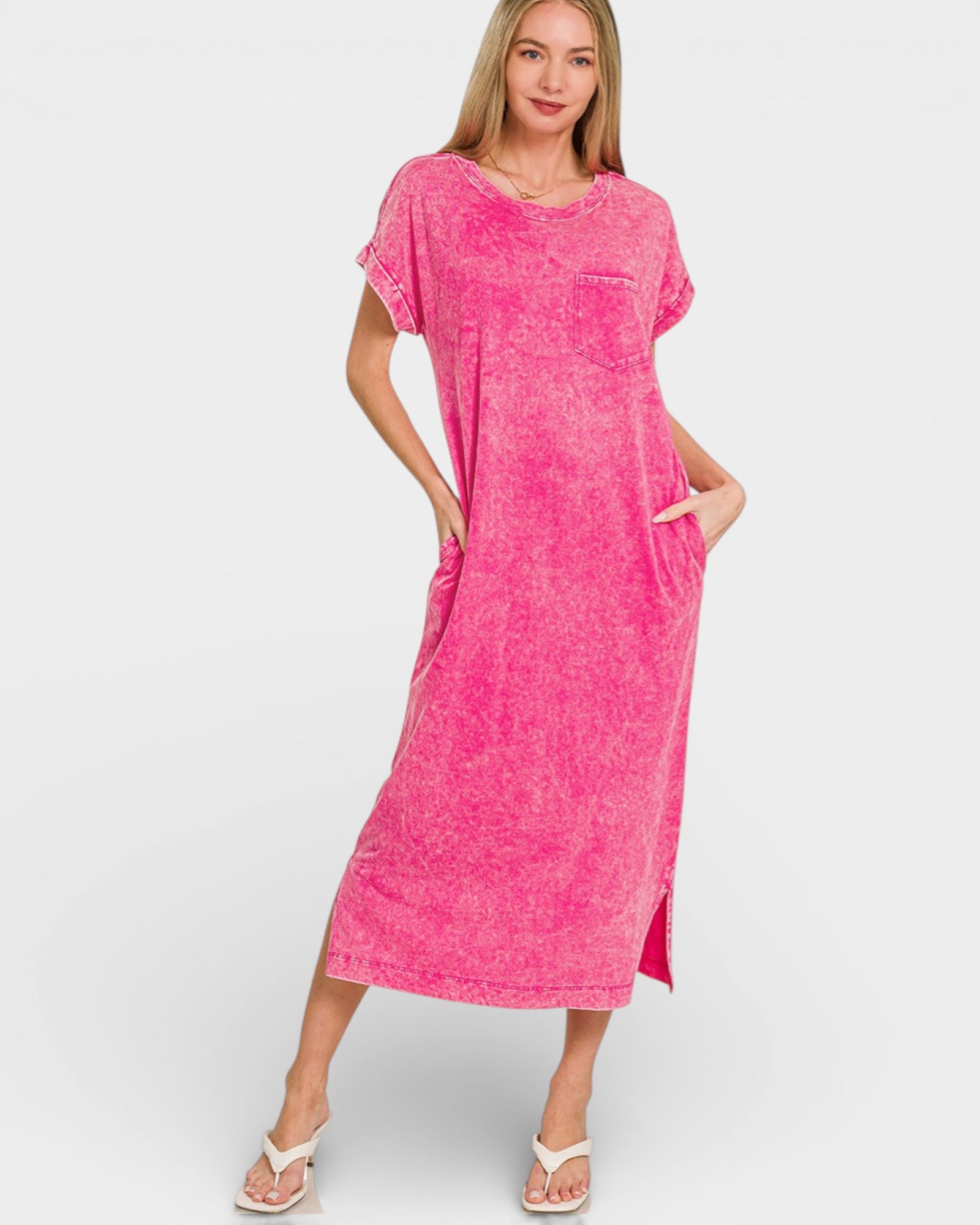 Woman wearing a pink dress on a white background