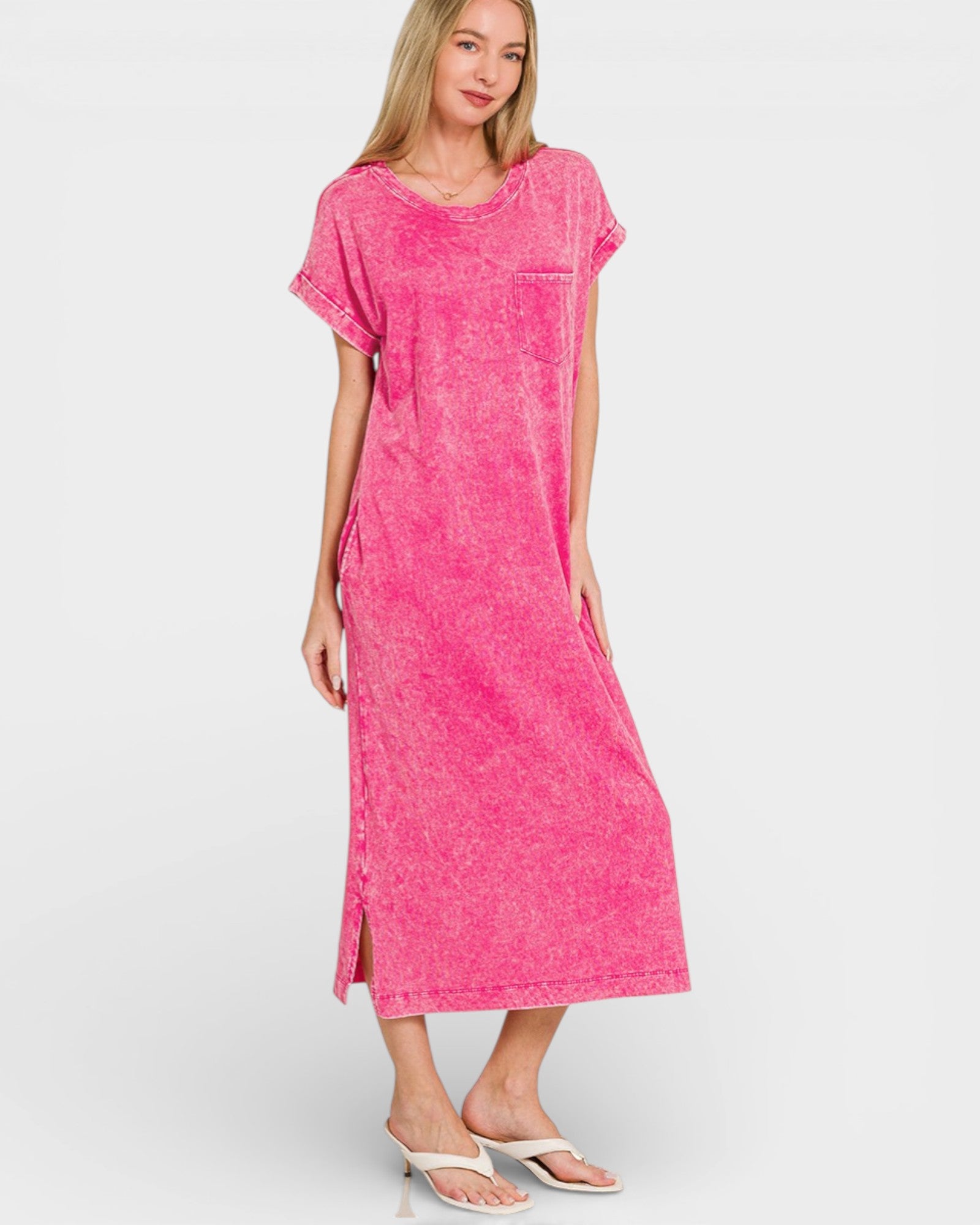 Woman wearing a pink dress on a white background