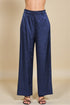 Navy blue pants on a beige background
