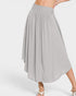 Gray pleated skirt worn by a person on a white background