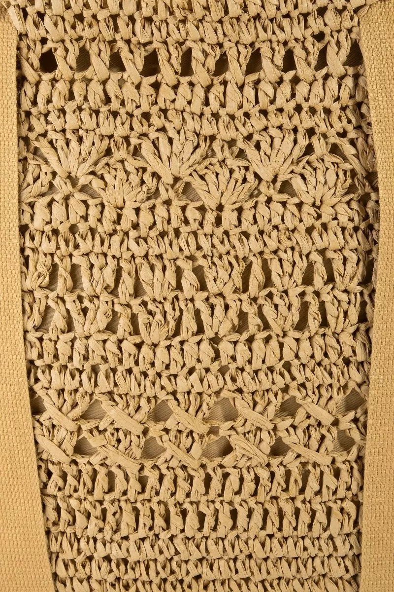 Close-up of beige woven fabric with a textured pattern