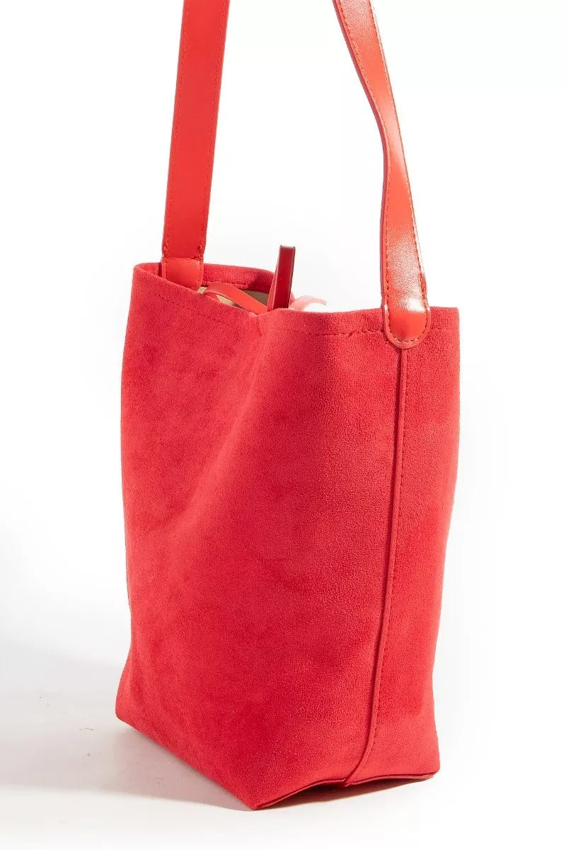 Red tote bag with handles on a white background