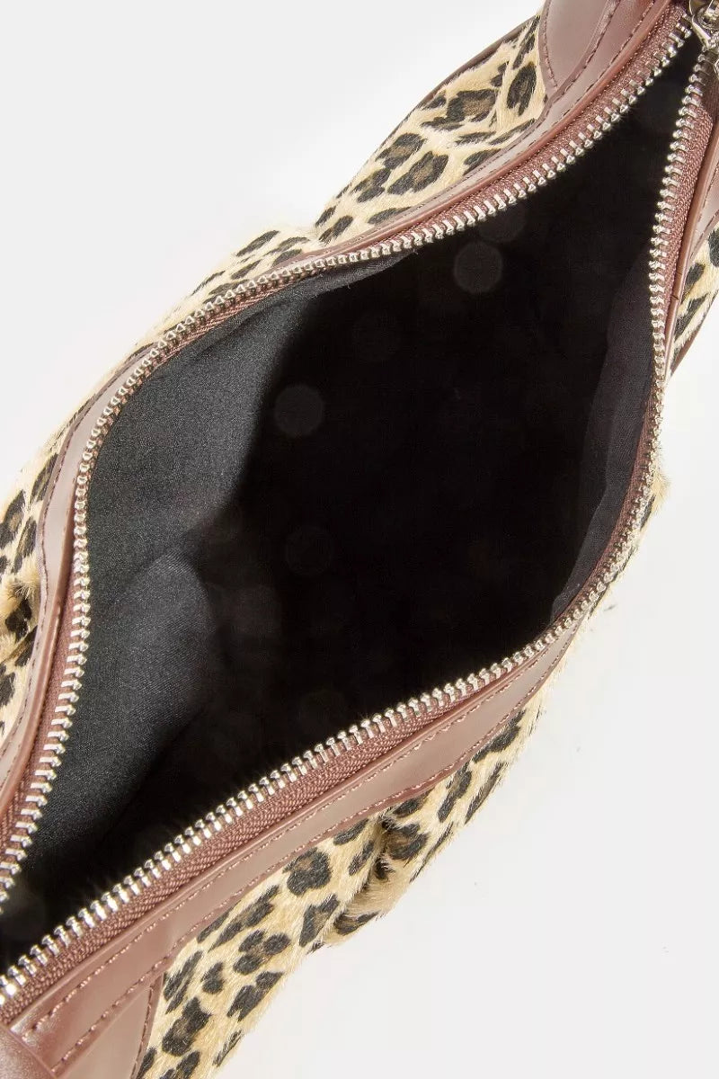 Leopard print bag with a zipper on a white background