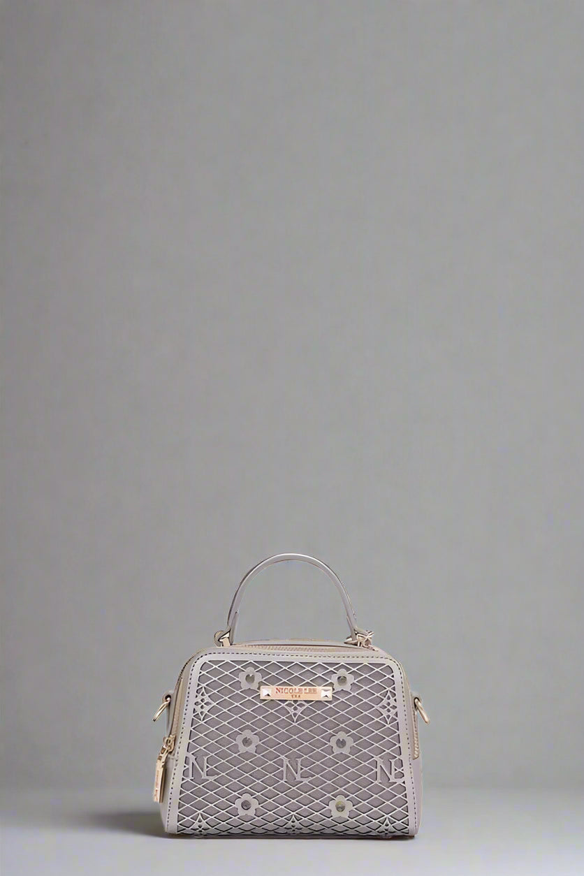 Gray handbag with decorative patterns on a white background