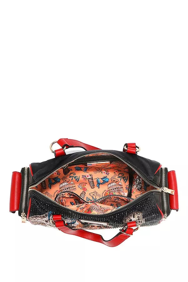 Black and red handbag with a colorful interior on a white background