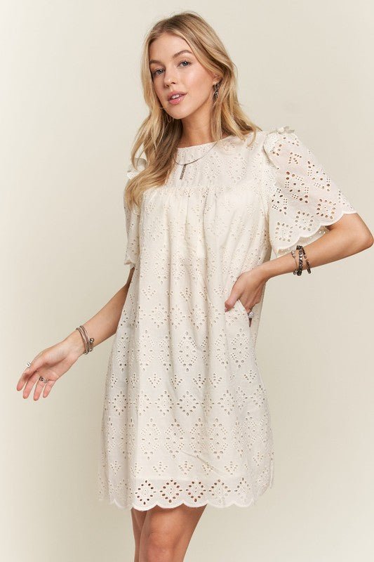 ADORA - Ruffled Eyelet Mini Dress in Natural