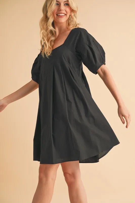 AEMI+CO - Black Pleated Puff Sleeve Babydoll Mini Dress