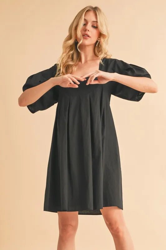 AEMI+CO - Black Pleated Puff Sleeve Babydoll Mini Dress