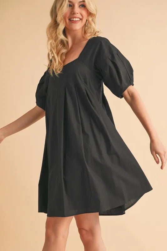 AEMI+CO - Black Pleated Puff Sleeve Babydoll Mini Dress