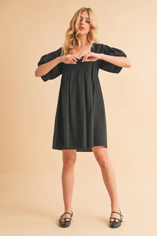AEMI+CO - Black Pleated Puff Sleeve Babydoll Mini Dress