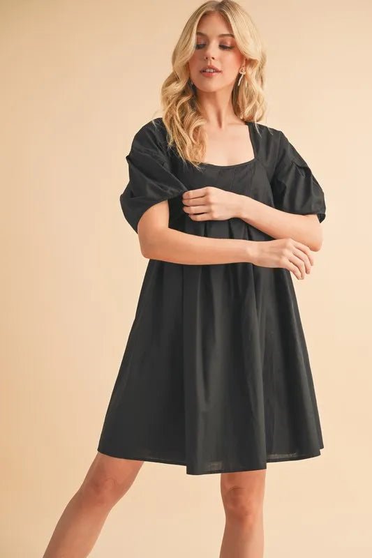 AEMI+CO - Black Pleated Puff Sleeve Babydoll Mini Dress