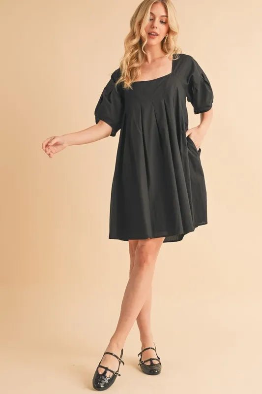 AEMI+CO - Black Pleated Puff Sleeve Babydoll Mini Dress