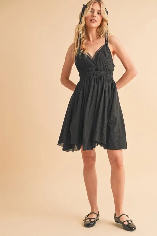 AEMI+CO - Black Smocked Lace Trim Mini Dress
