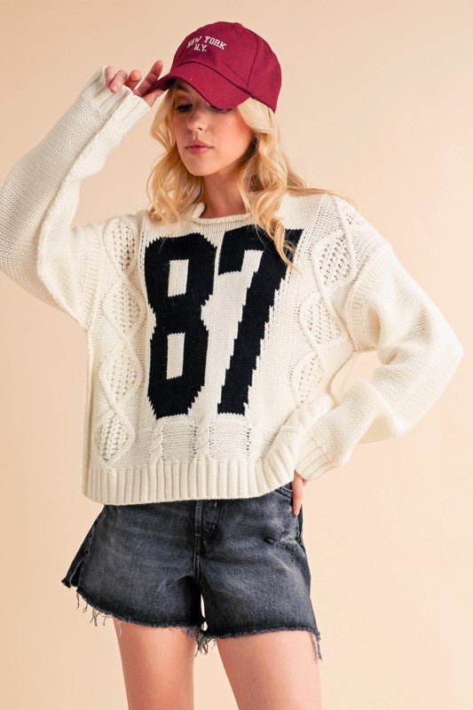 AEMI+CO - White Number 87 Cable Knit Sweater