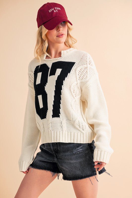 AEMI+CO - White Number 87 Cable Knit Sweater