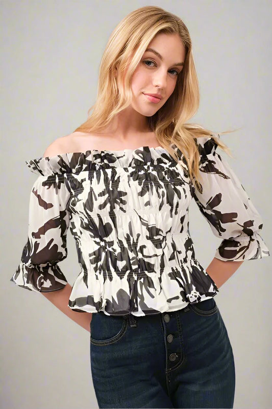 And the Why - Smocked Off - Shoulder Peplum Top in Black & White Floral