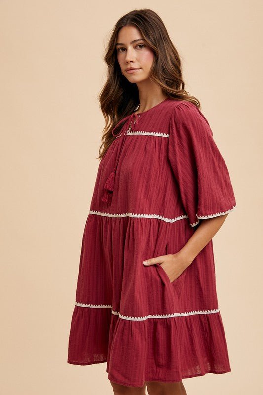 ANNIE WEAR - Tie Neck Half Sleeve Tiered Mini Dress in Burgundy