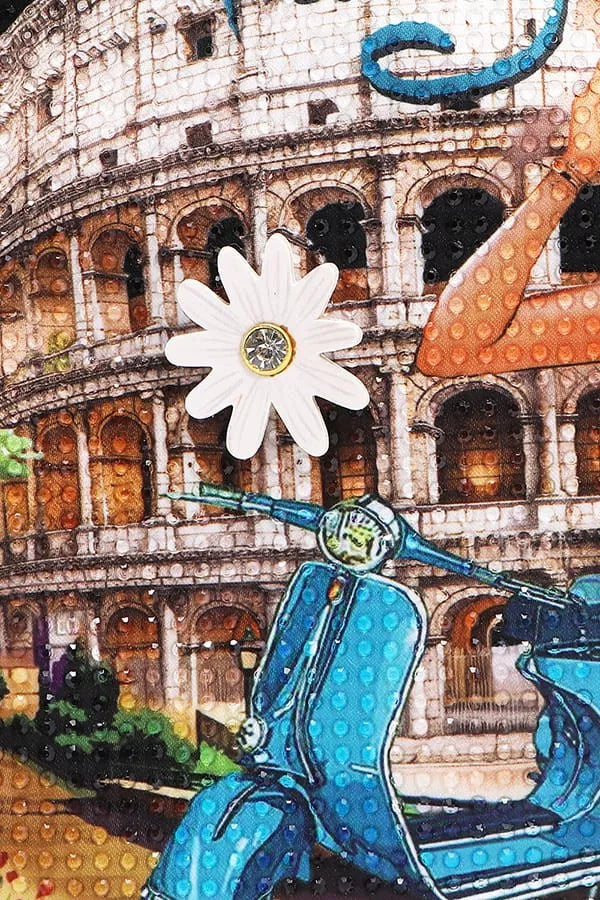 Blue scooter with a white flower on the handlebar in front of the Colosseum, Rome.